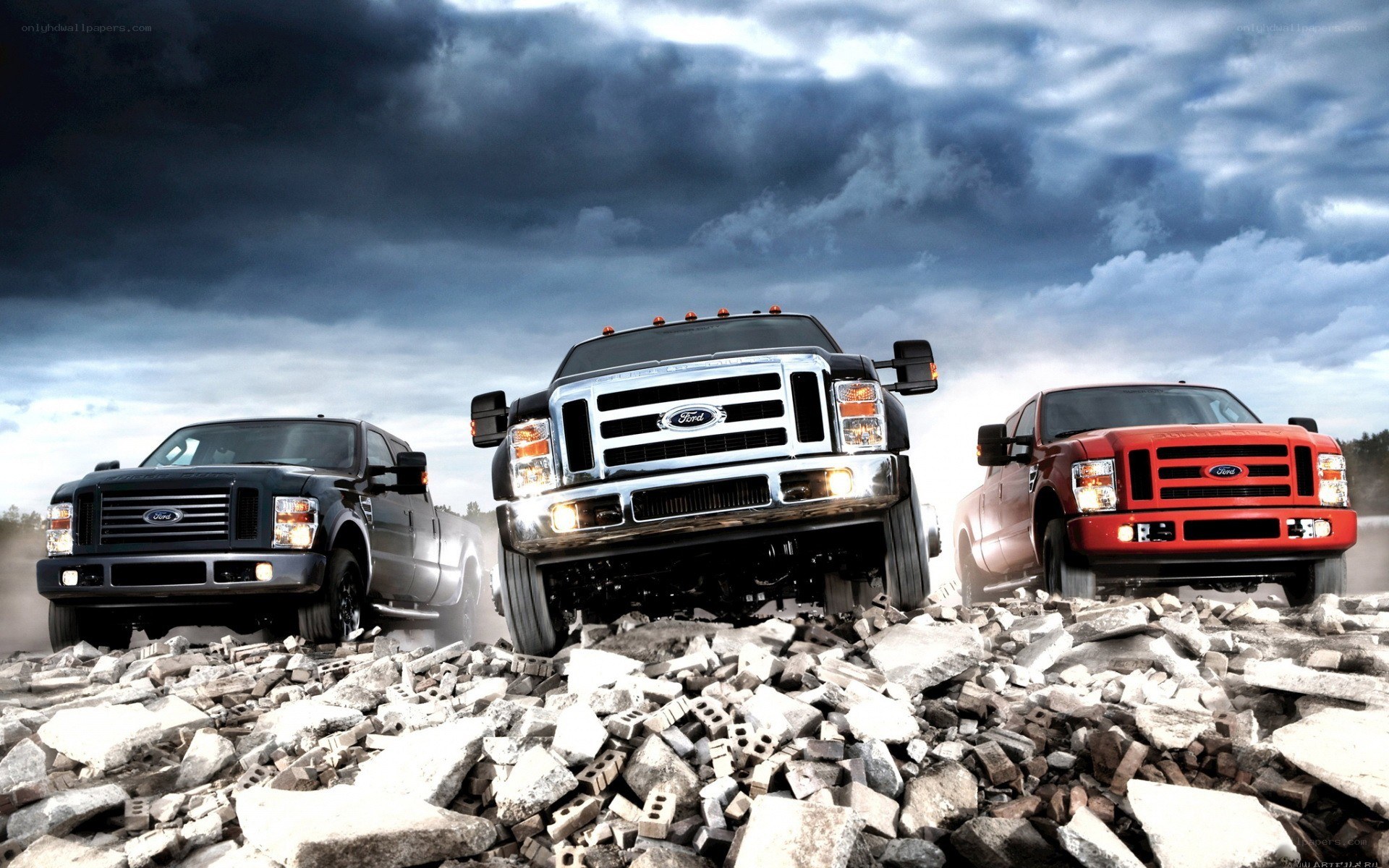 Ford trucks on rubble