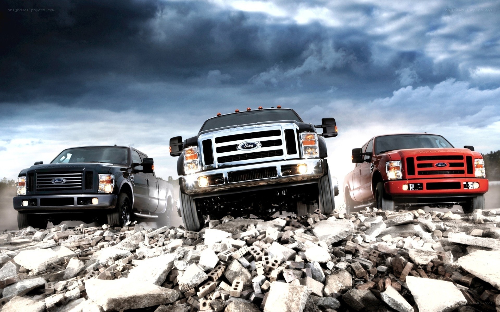Ford trucks on rubble