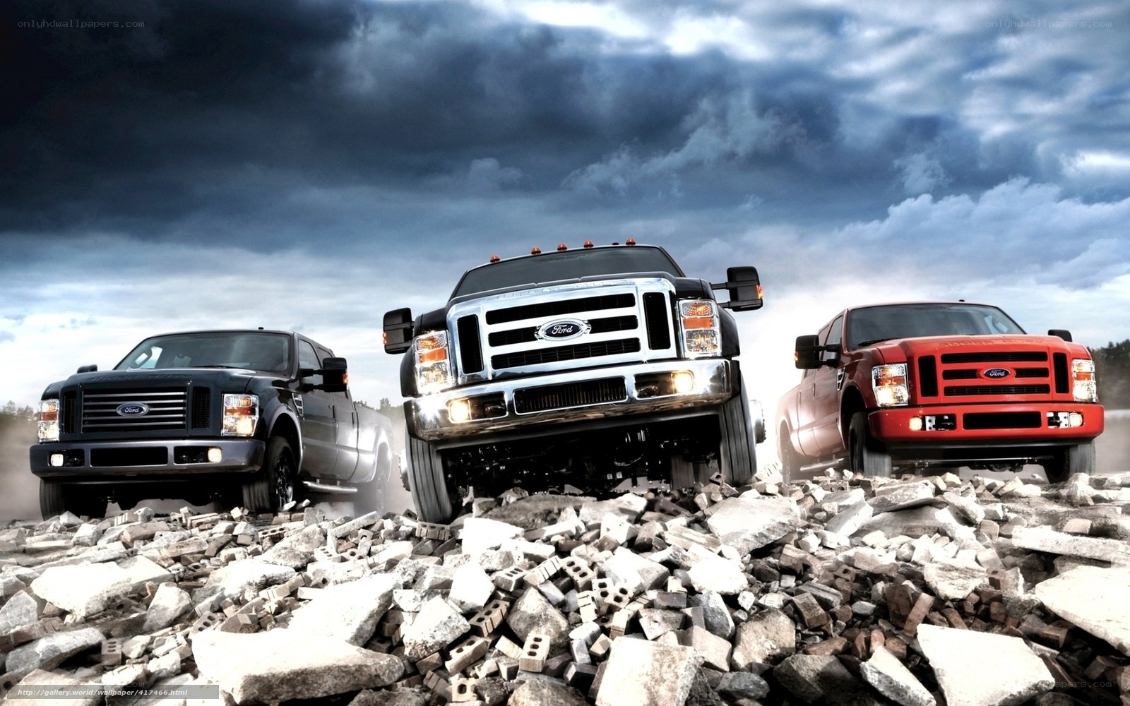Ford trucks on rubble