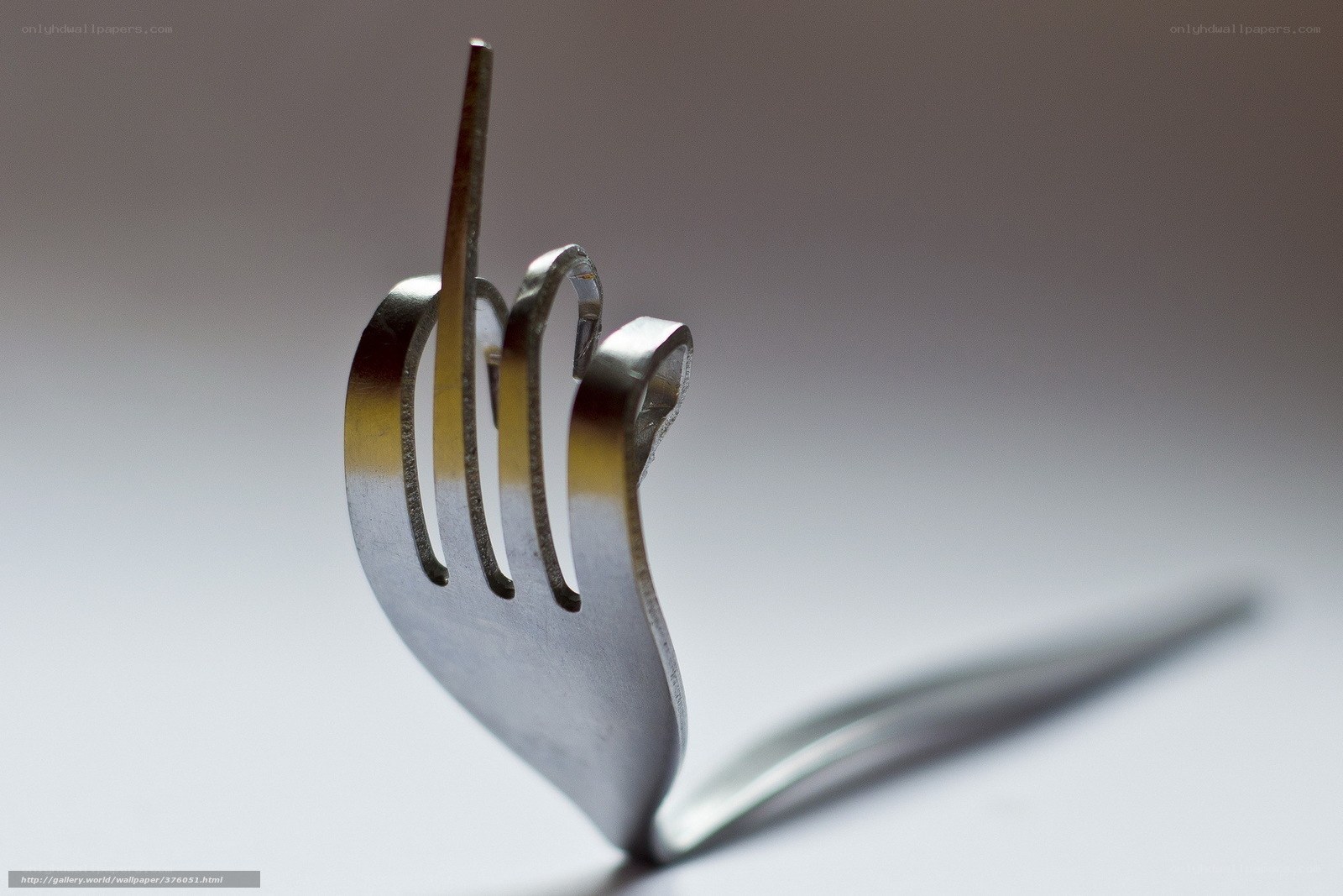 Fork shaped like a hand
