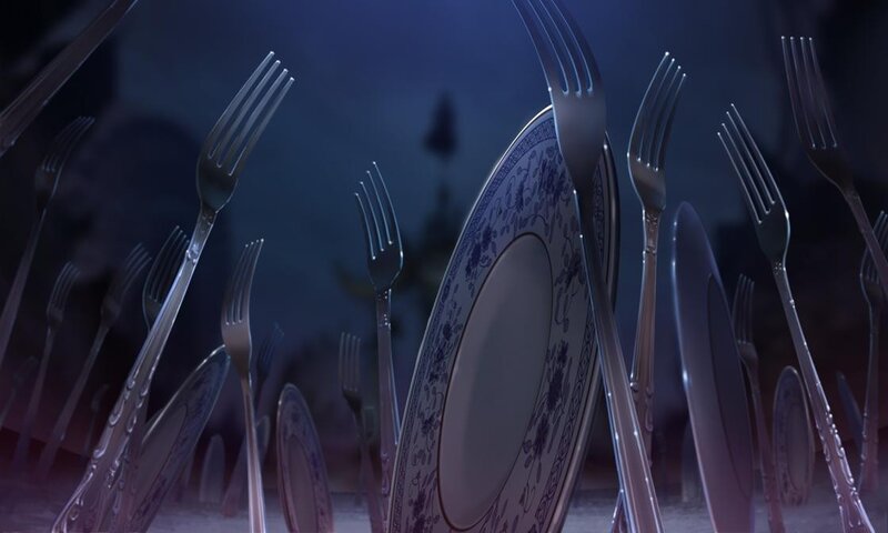 Forks and plates in a dark room