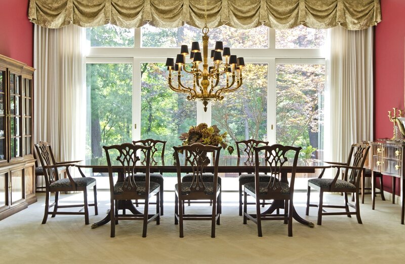 formal dining room with chandelier