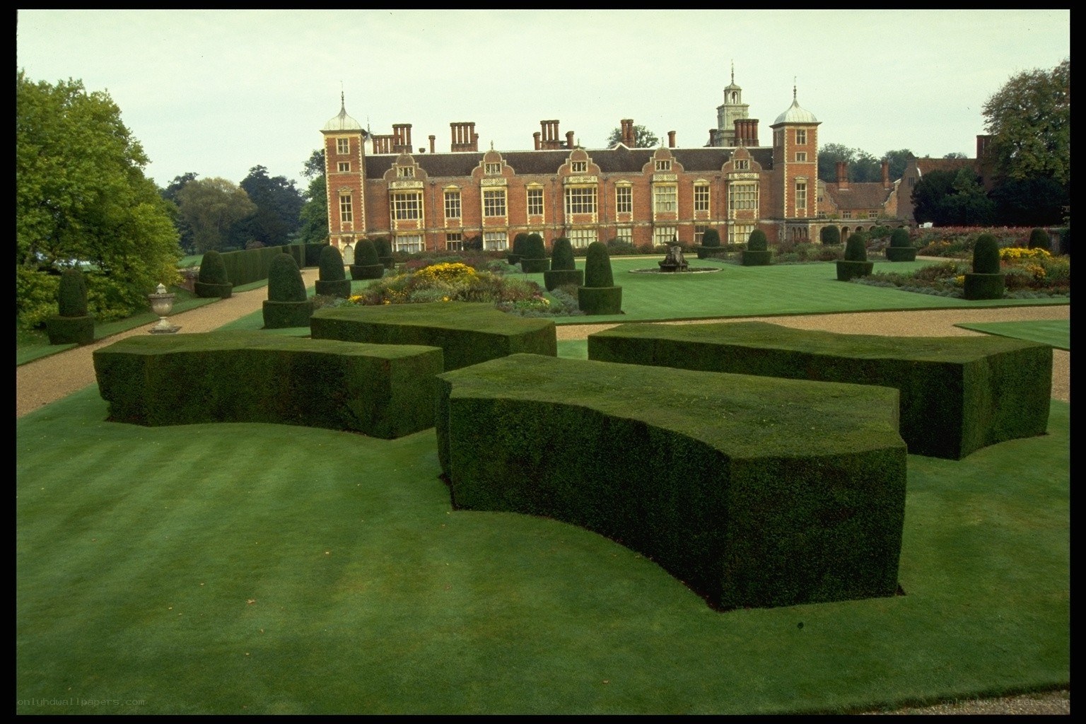 formal garden with manor house