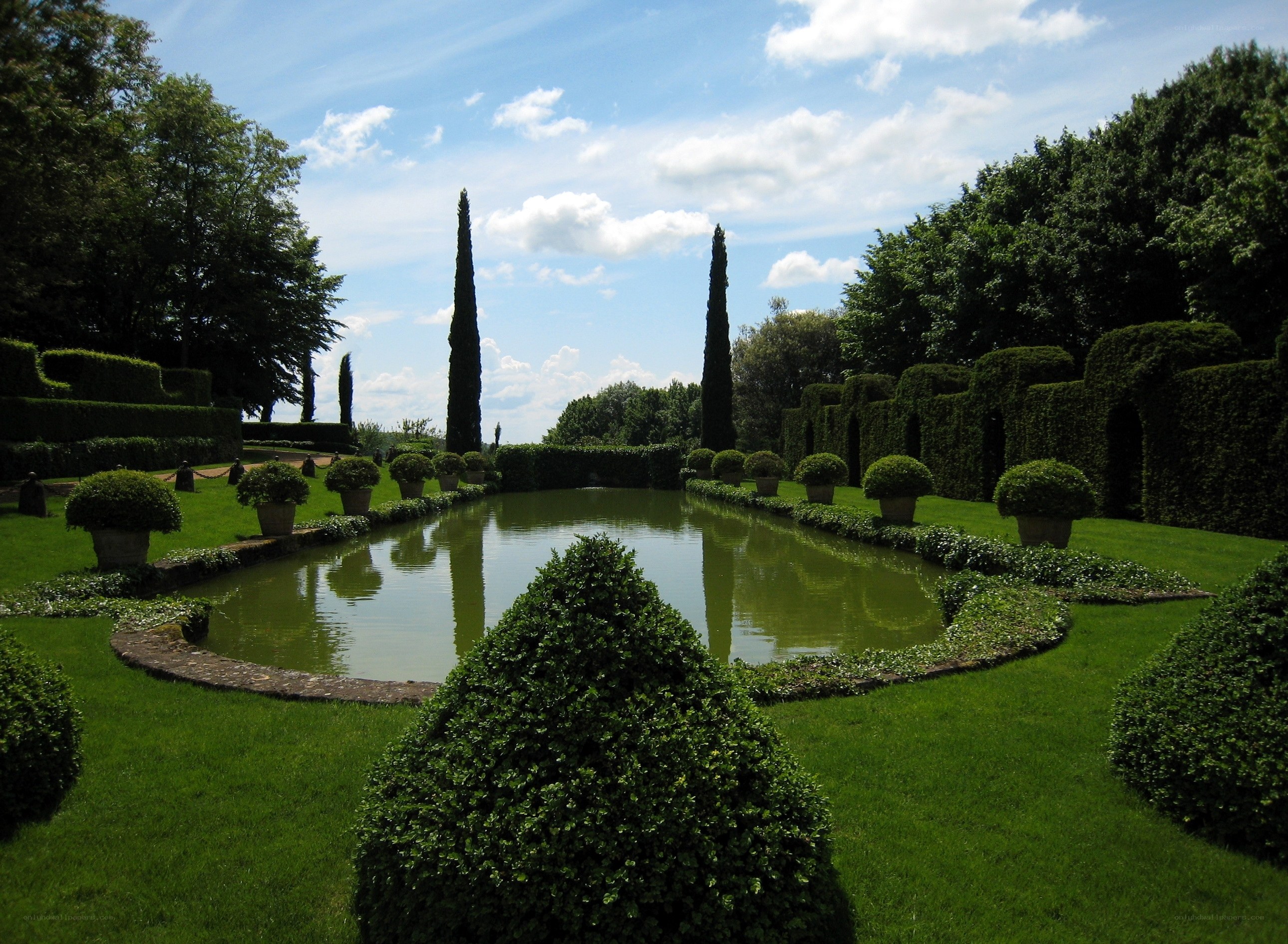 formal garden with pond and hedges