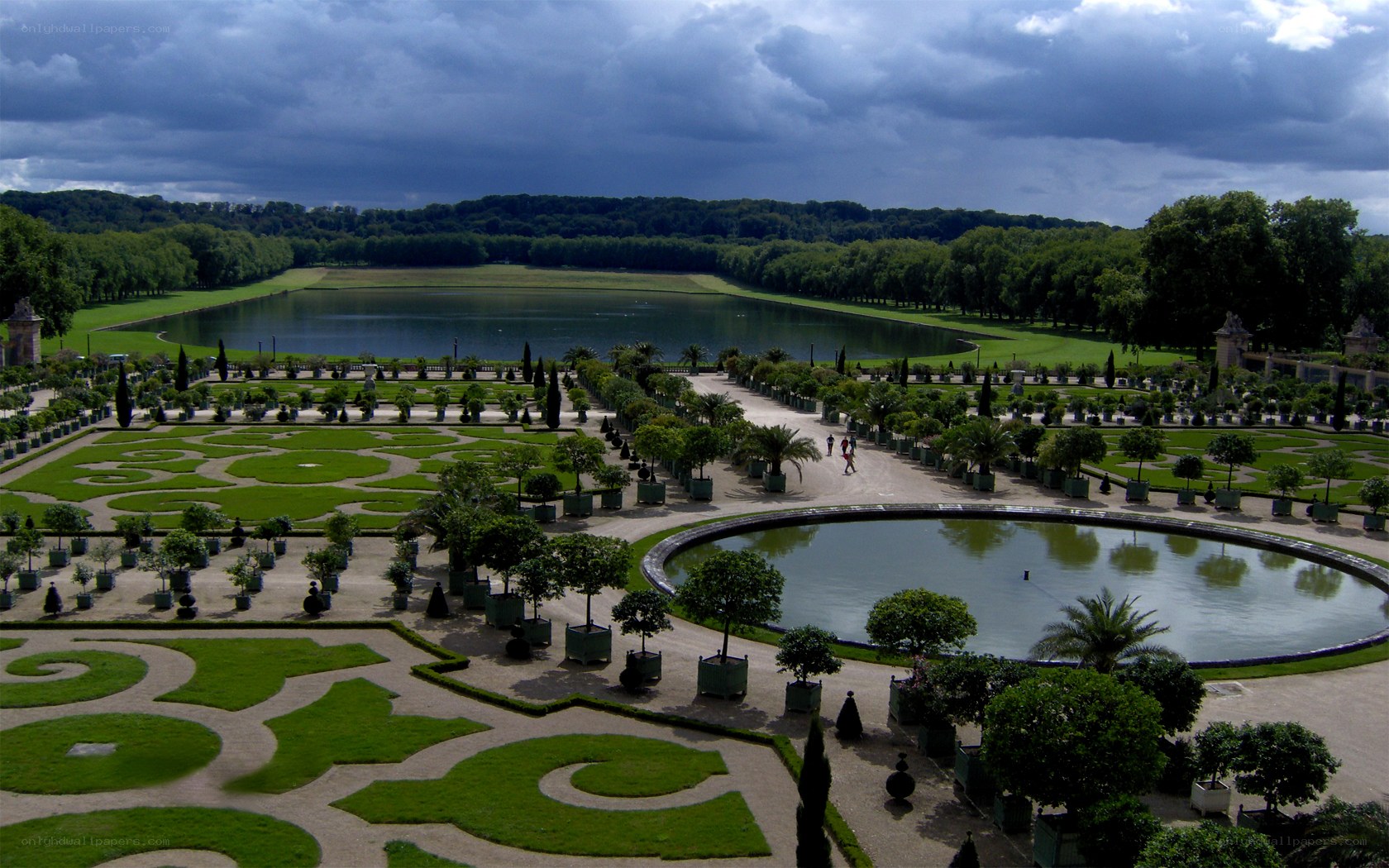 formal gardens with lake