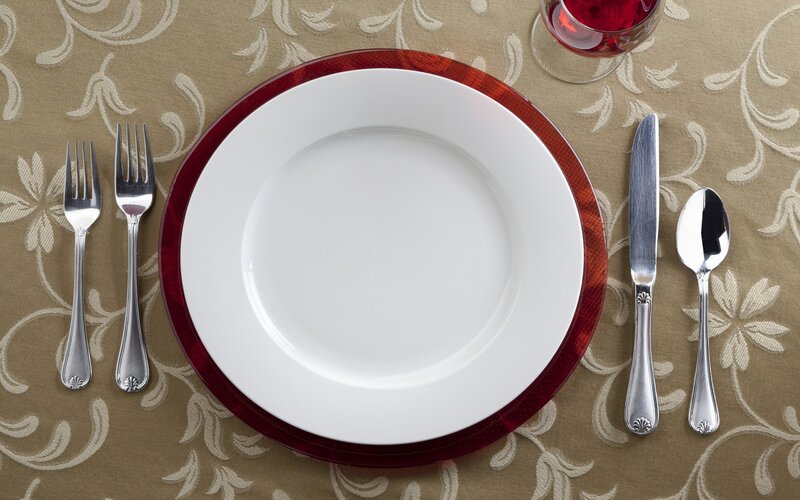 formal table setting with plates and silverware