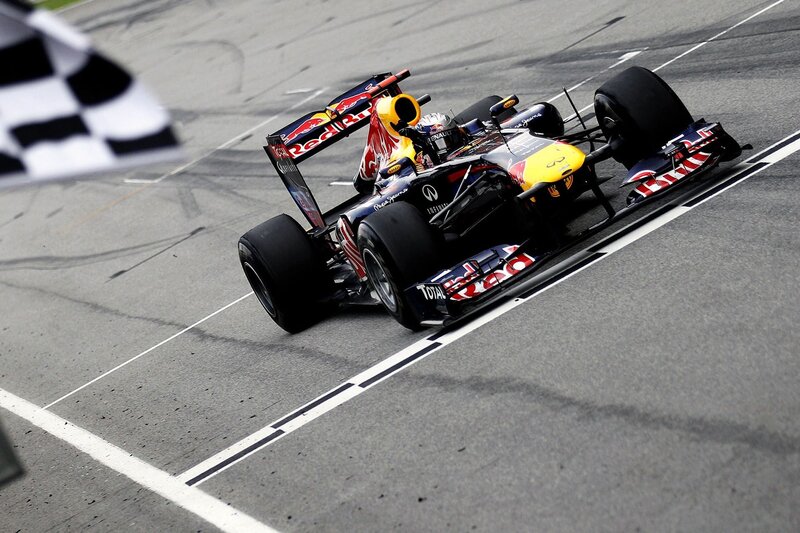 Formula 1 car crossing finish line