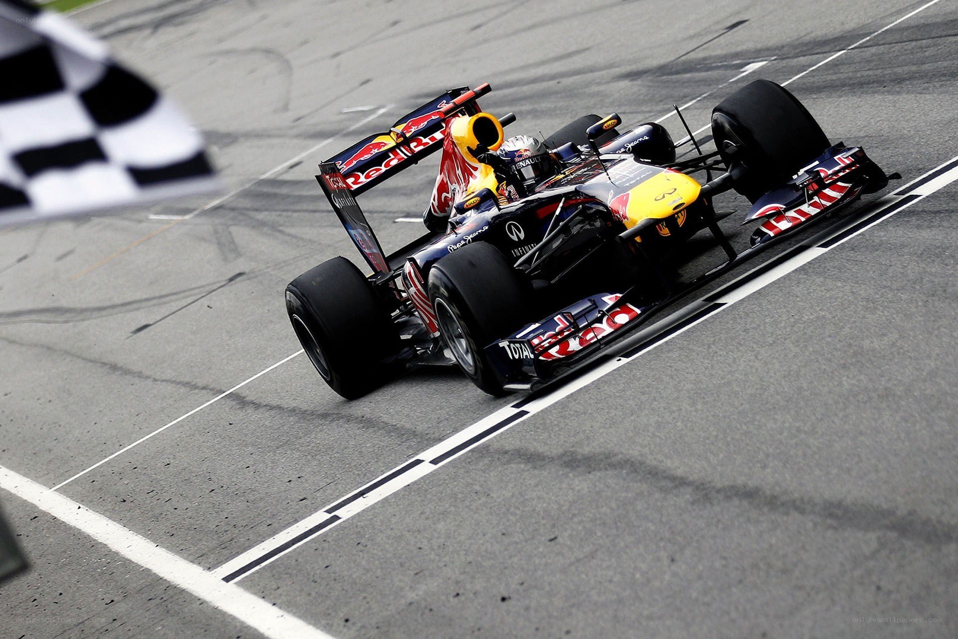 Formula 1 car crossing finish line