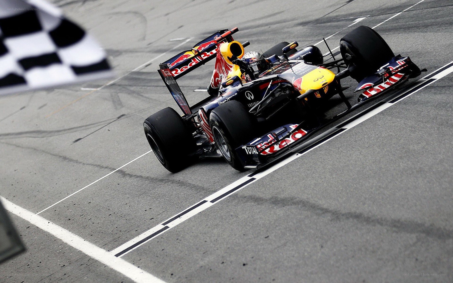 Formula 1 car crossing finish line