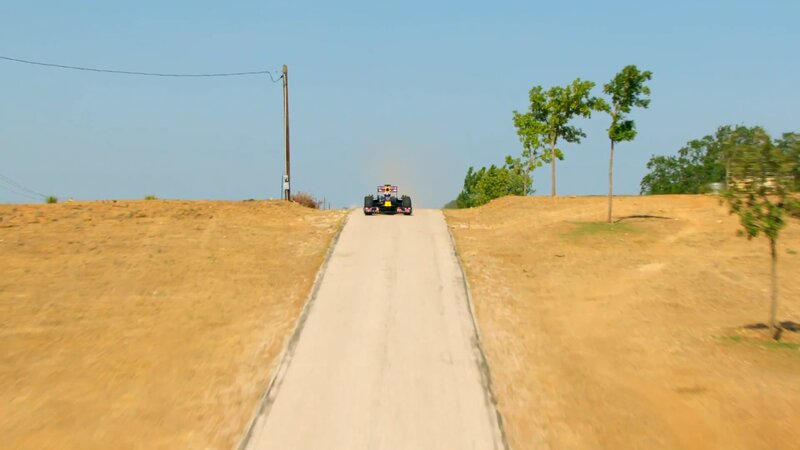 Formula 1 car on a rural road