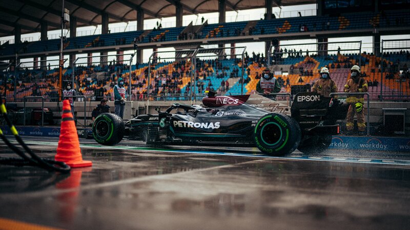 Formula 1 Car on Track — Black, Dramatic, Photograph