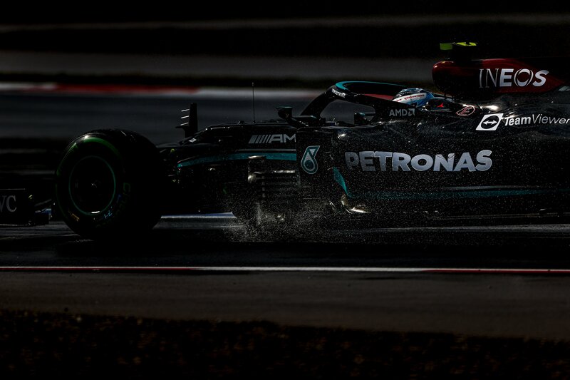 Formula 1 Car on Track — Black, Dramatic