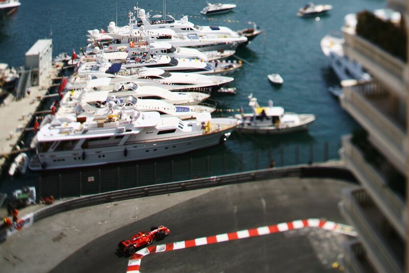 Formula 1 car on track near marina