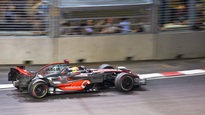 Formula 1 car racing at night