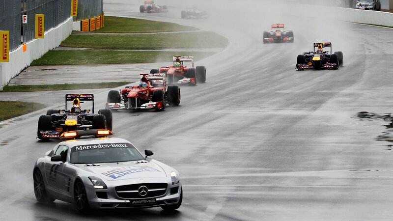 Formula 1 Cars on Track — Gray, Rainy