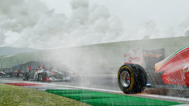 Formula 1 cars racing in rain