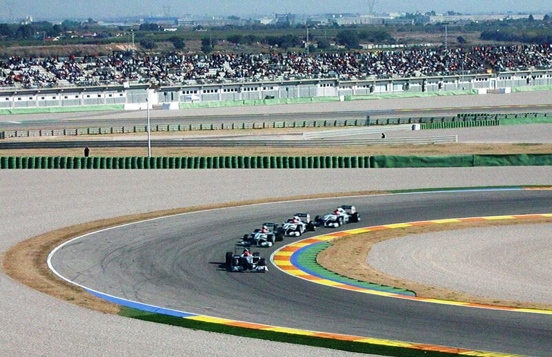 Formula 1 cars racing on a track