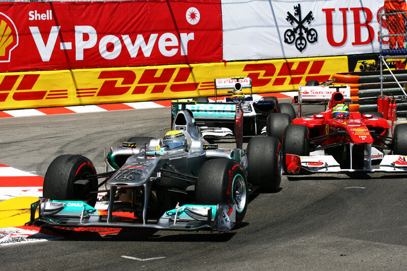 Formula 1 cars racing on track