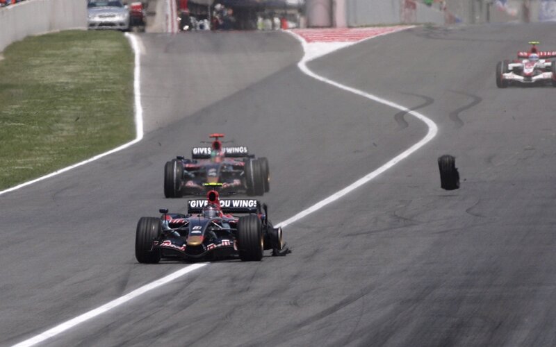Formula 1 cars racing on track