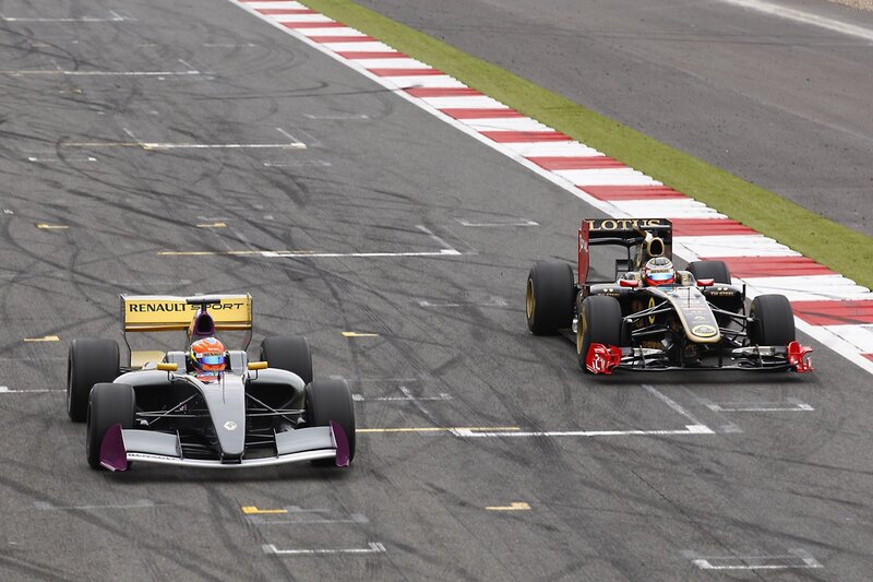 Formula 1 cars racing on track
