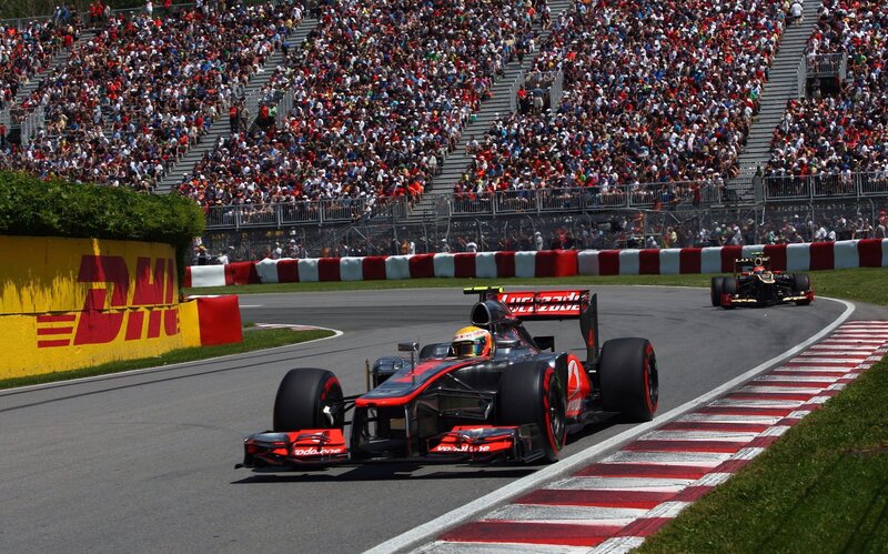 Formula 1 cars racing on track