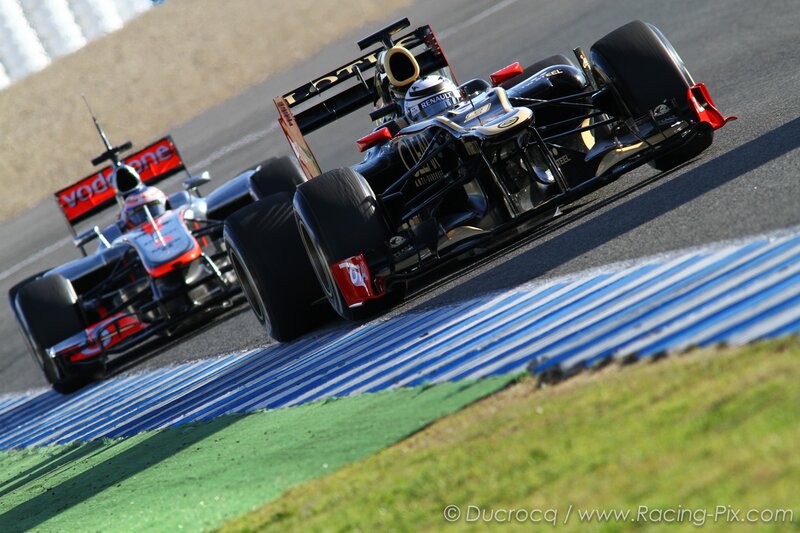 Formula 1 cars racing on track