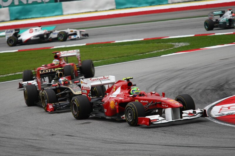 Formula 1 cars racing on track
