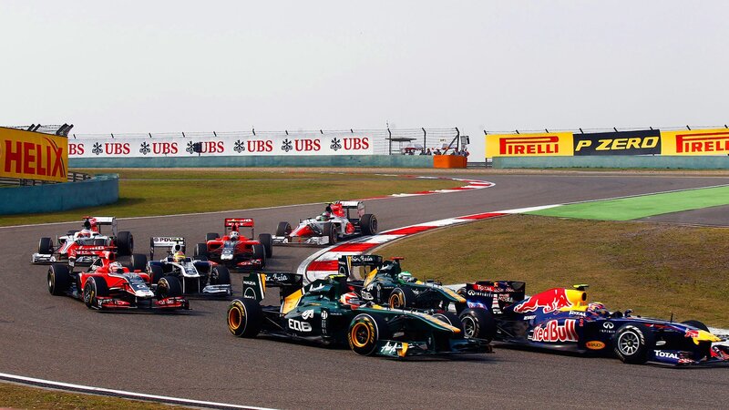 Formula 1 cars racing on track
