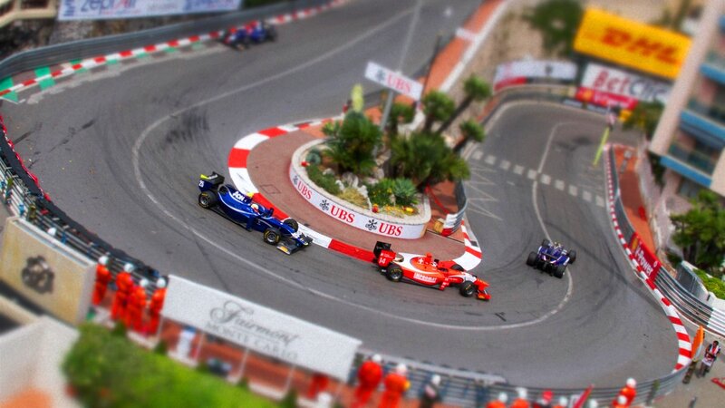 Formula 1 cars racing on track