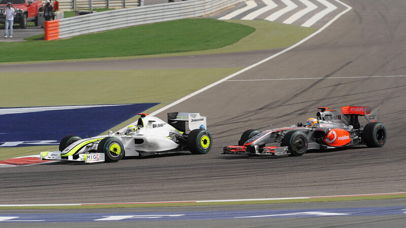 Formula 1 cars racing on track