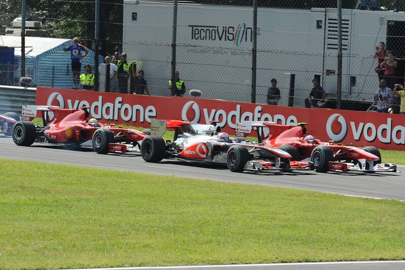 Formula 1 cars racing on track