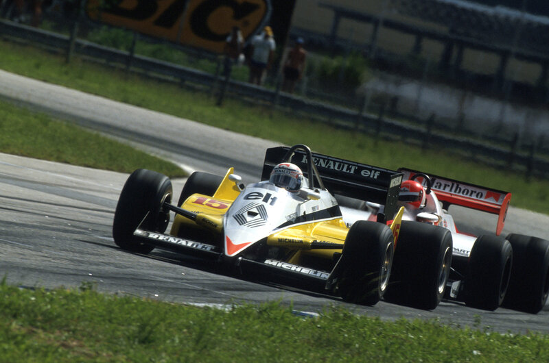 Formula 1 cars racing on track