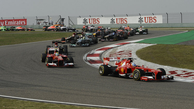 Formula 1 Cars Racing — Red, Competitive, Afternoon