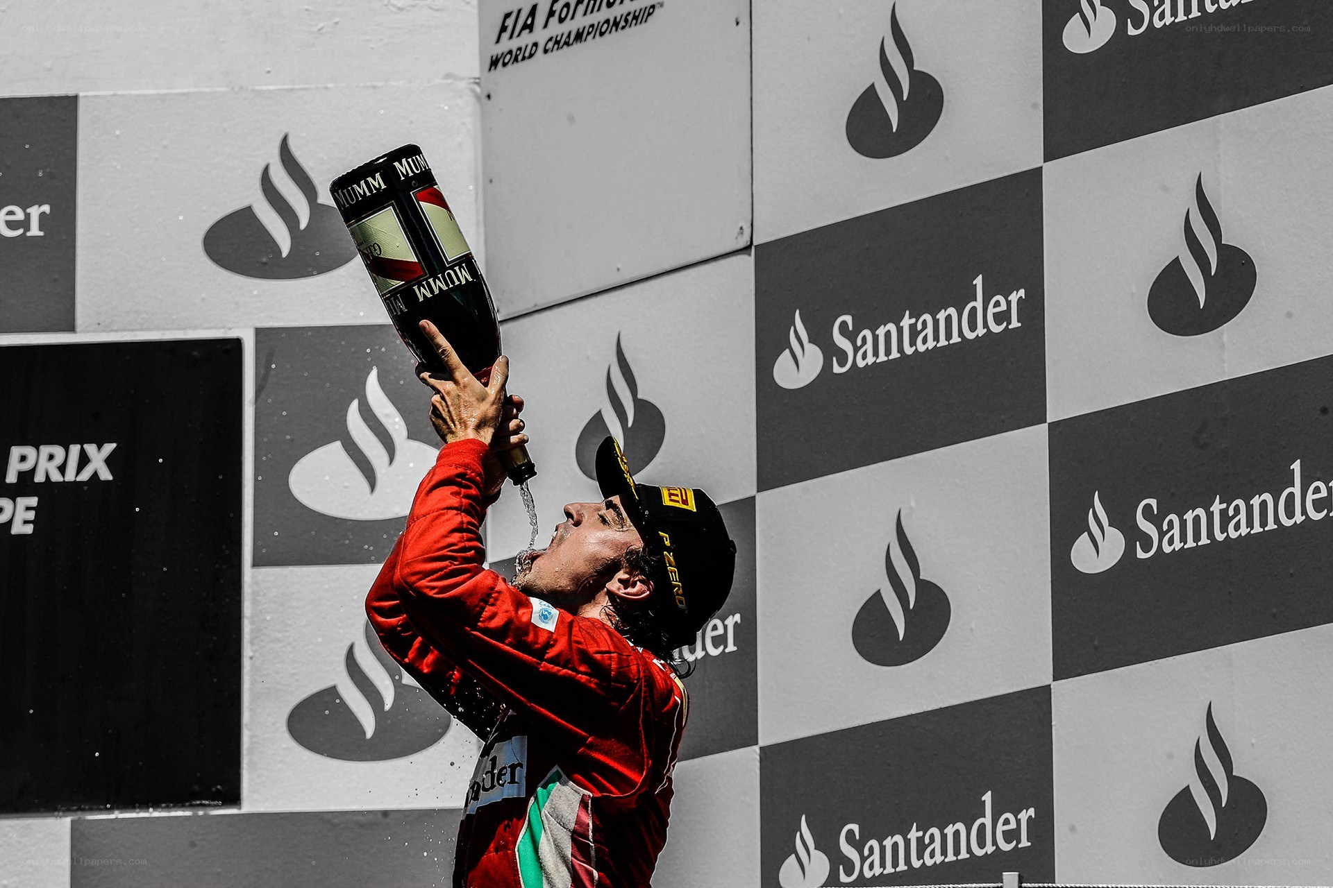 Formula 1 driver celebrating on podium
