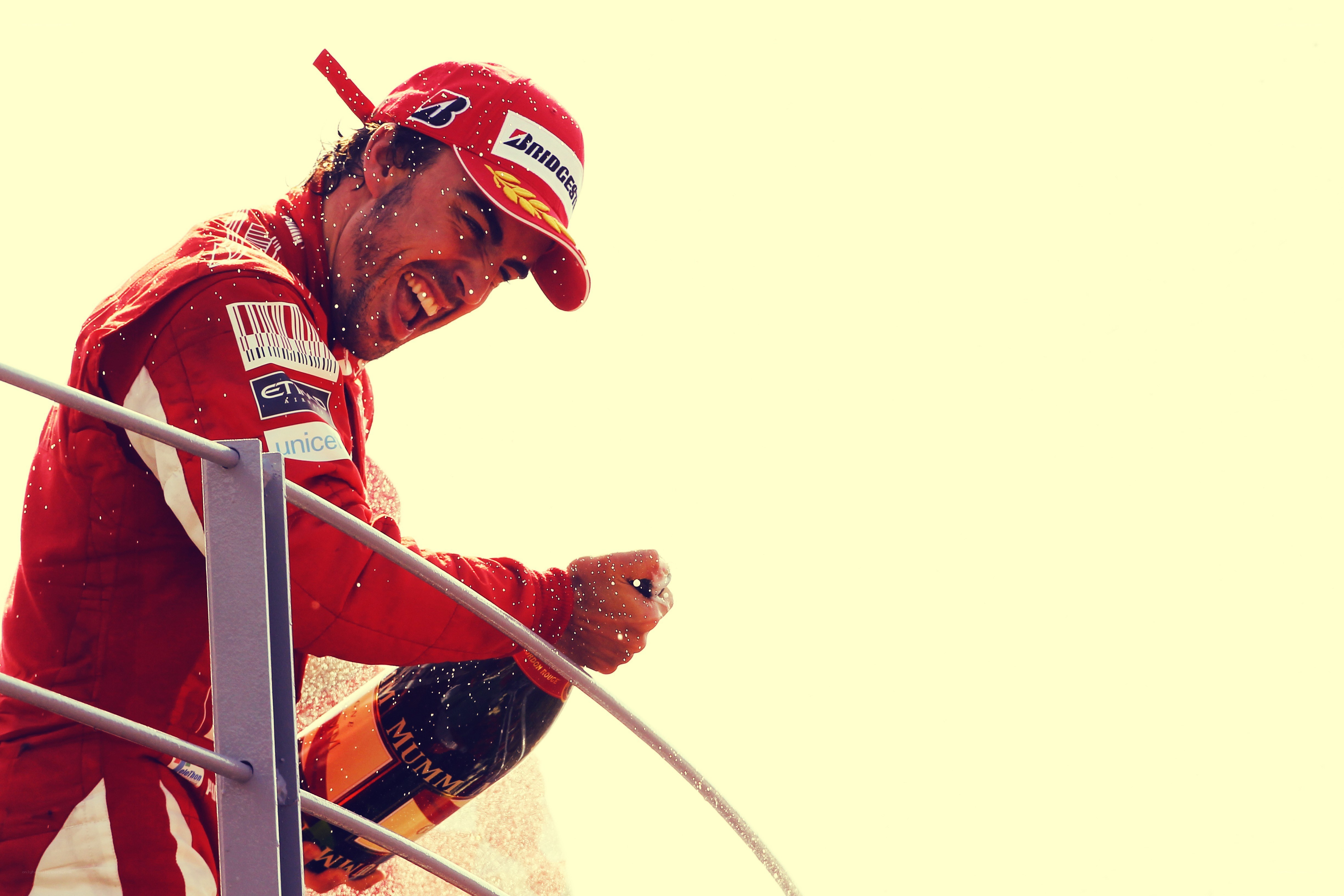 Formula 1 driver celebrating with champagne