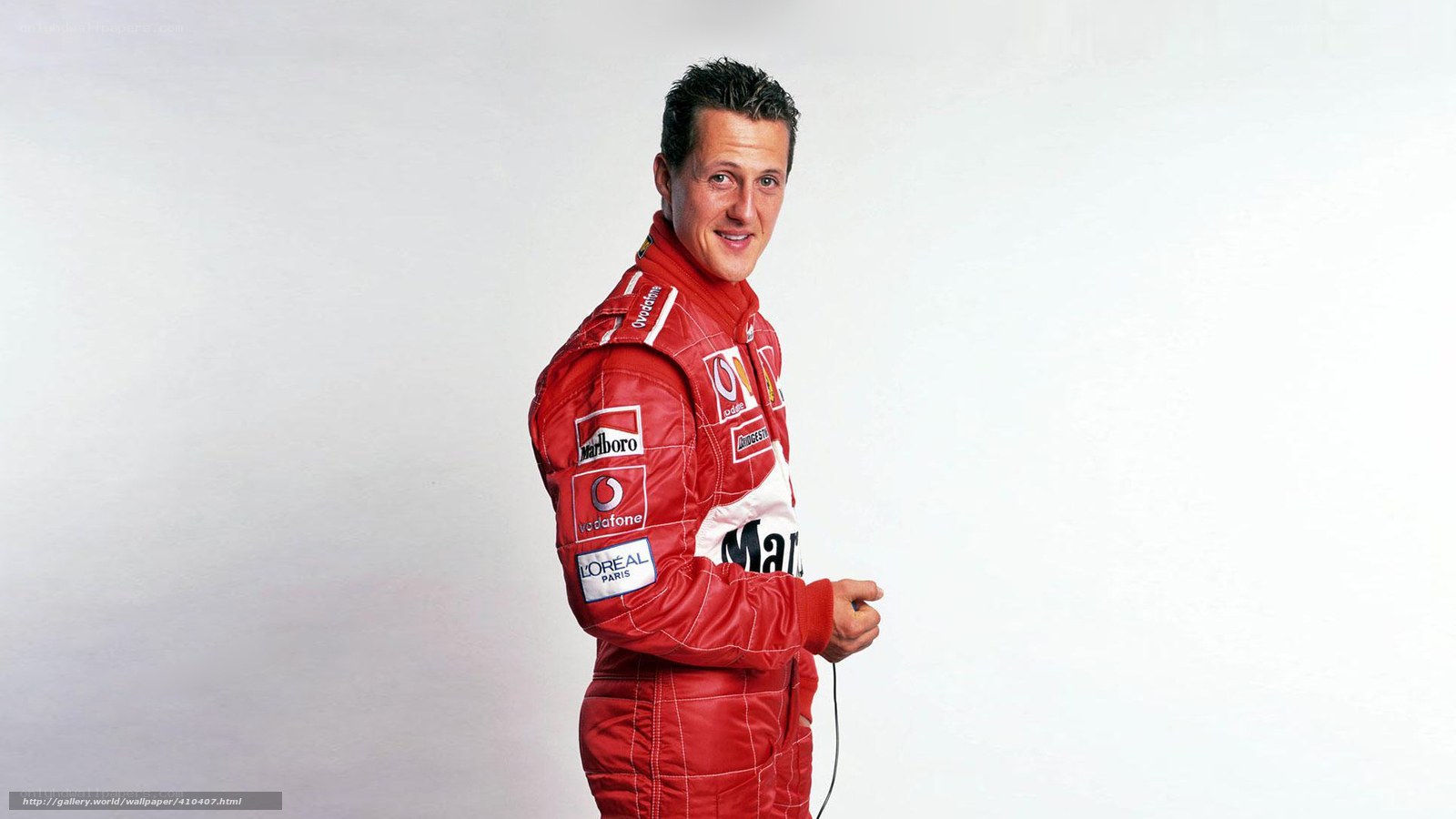 Formula 1 driver in red suit