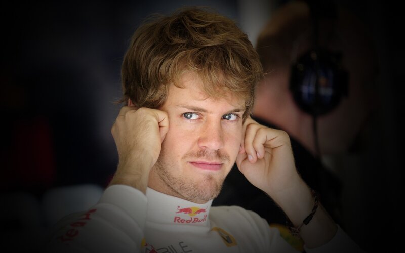 Formula 1 driver in team suit