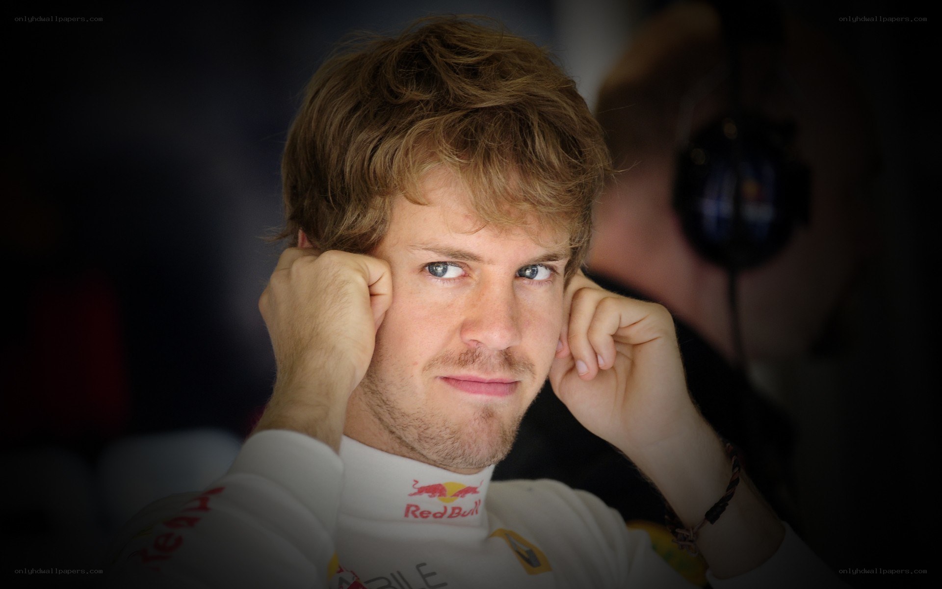 Formula 1 driver in team suit
