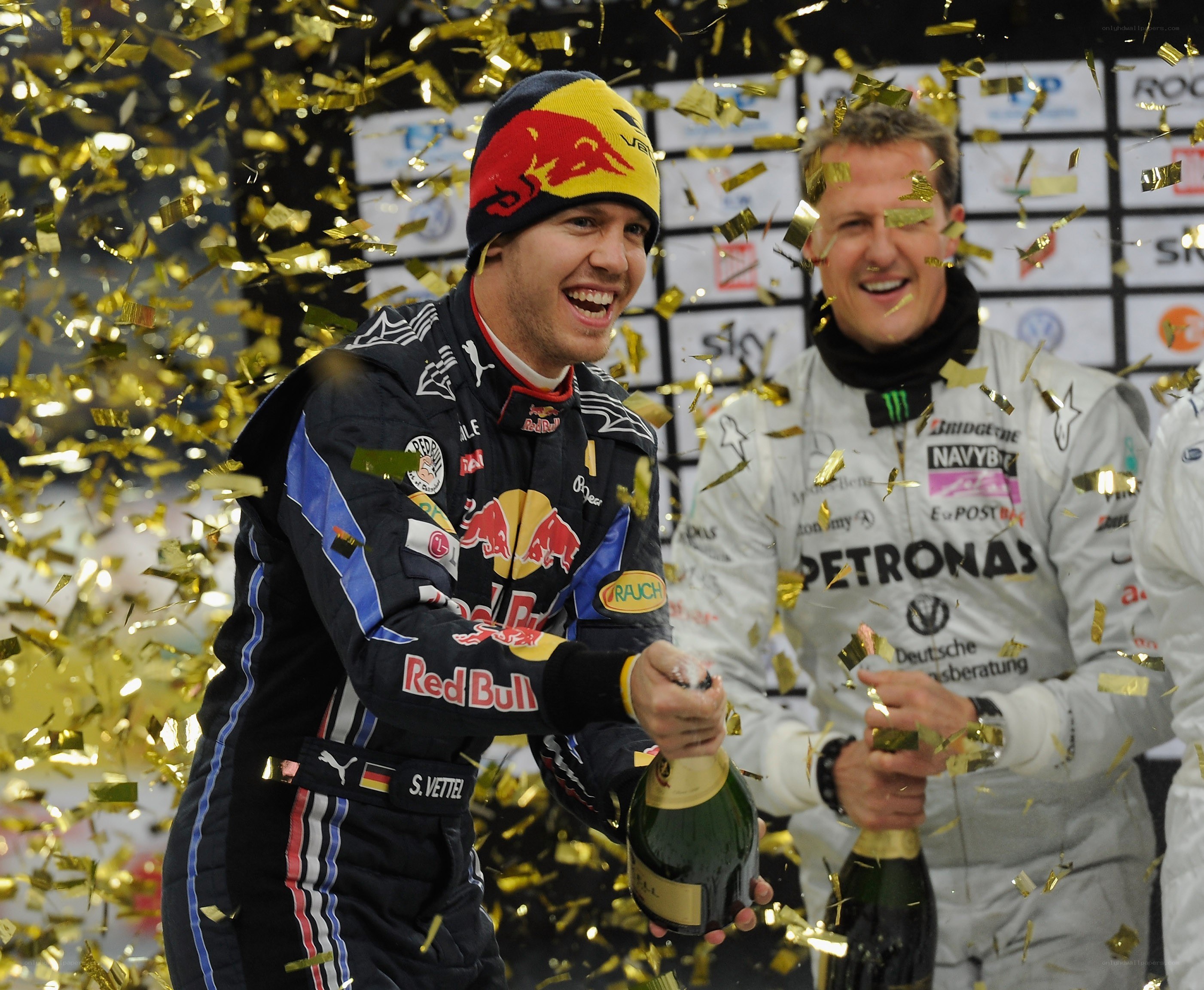 Formula 1 drivers celebrate with champagne