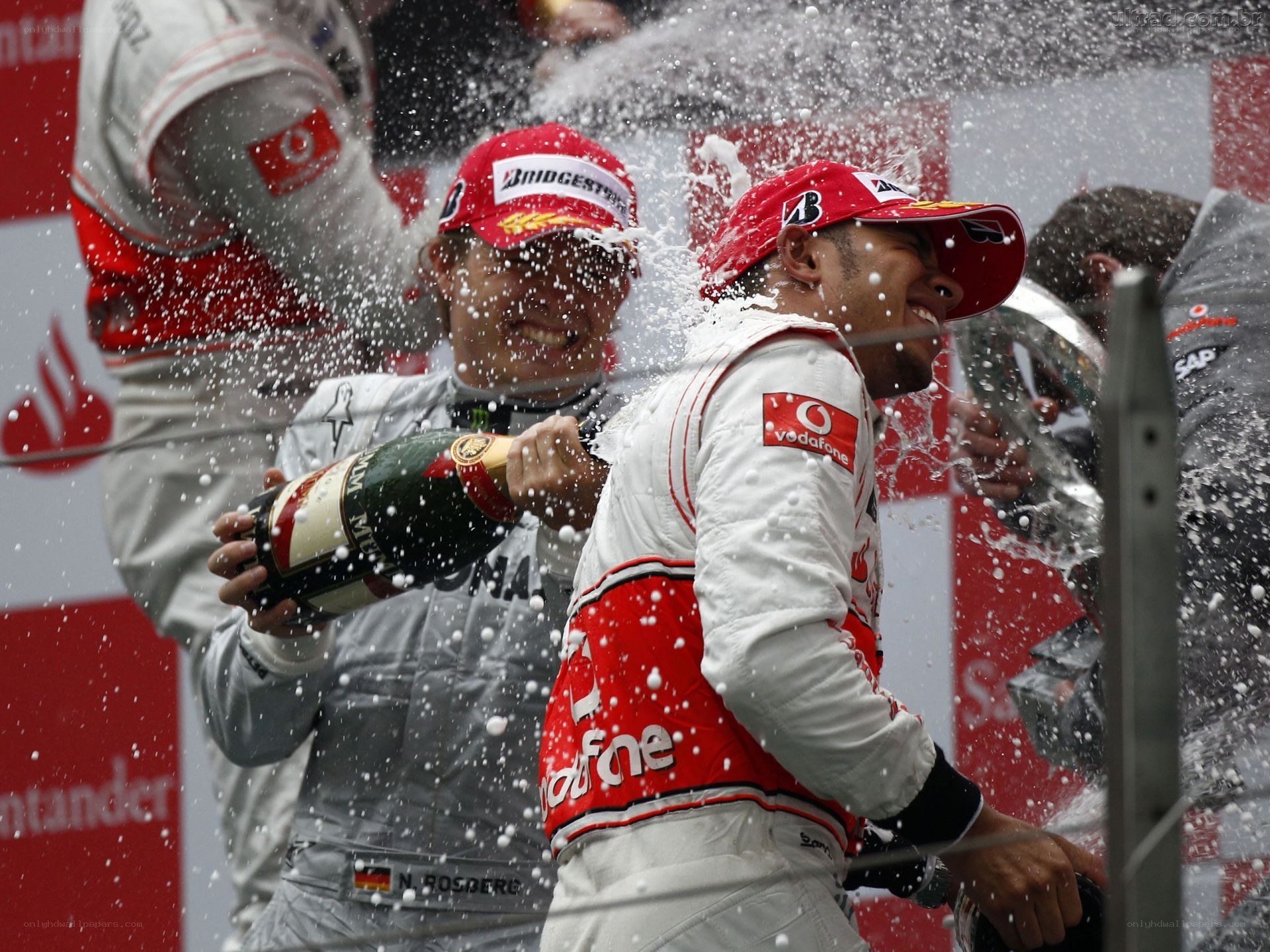 Formula 1 drivers celebrating on podium