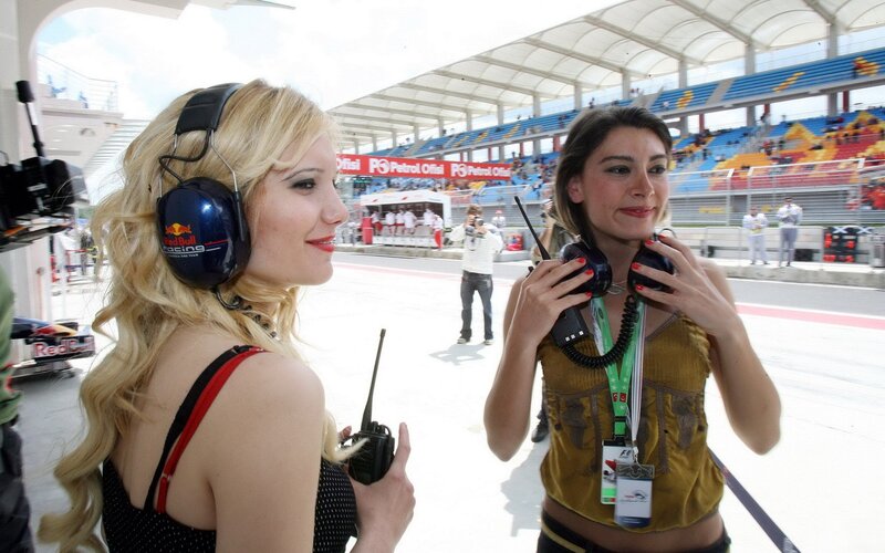 Formula 1 grid girls at race track