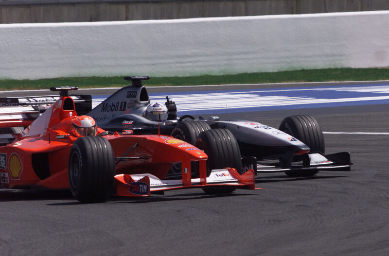 Formula 1 race cars on track
