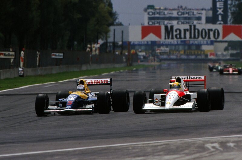 Formula 1 race cars on track