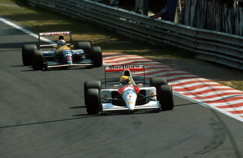 Formula 1 race cars on track