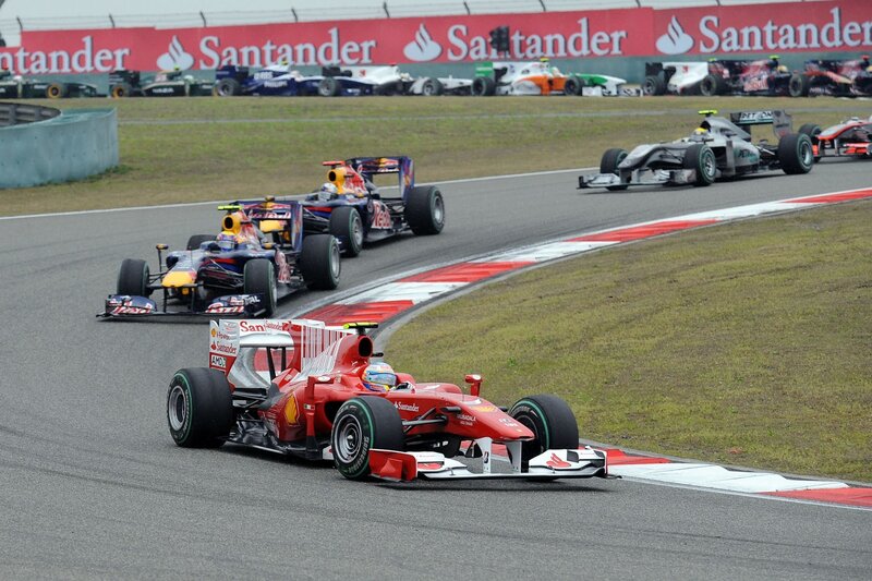 Formula 1 race cars on track