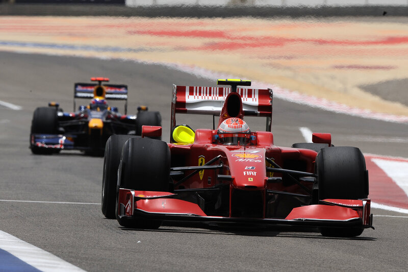 Formula 1 race cars on track