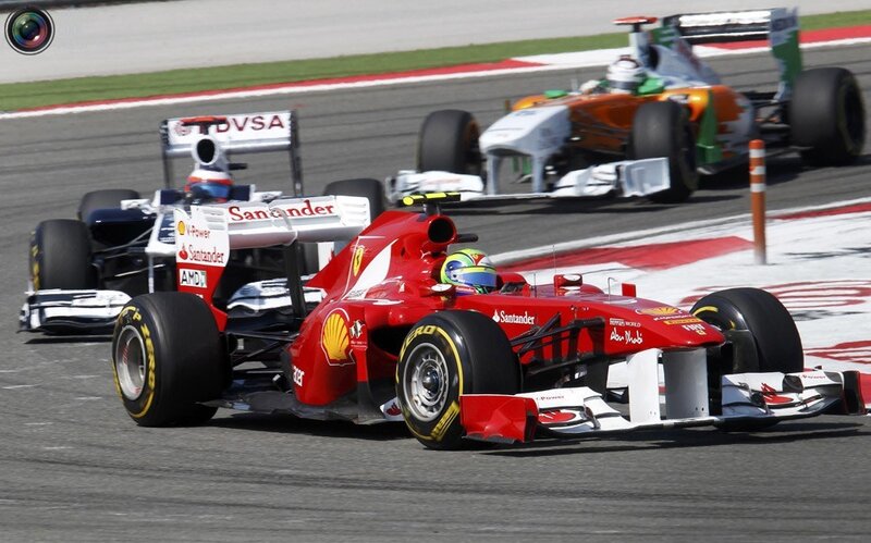 Formula 1 race cars on track