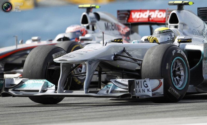 Formula 1 race cars on track