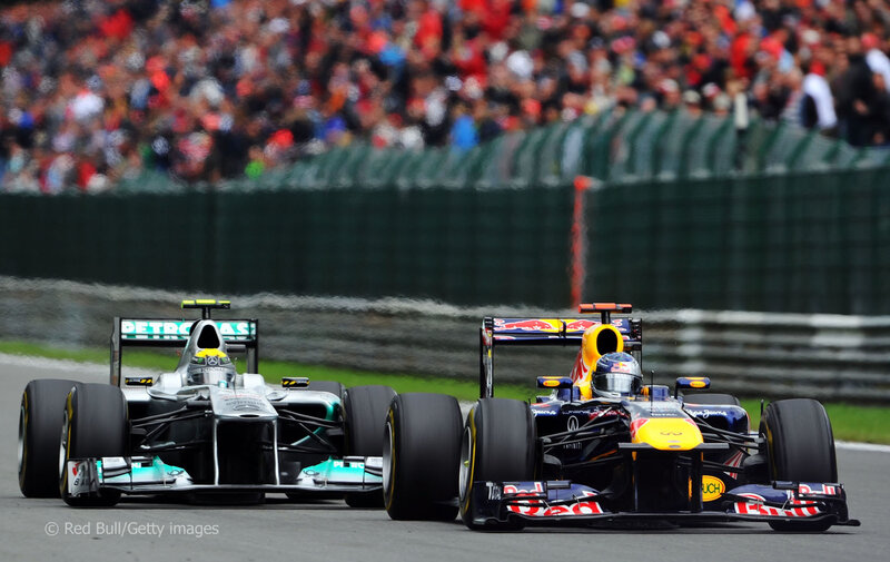 Formula 1 race cars on track