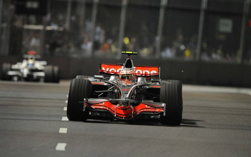 Formula 1 race cars on track